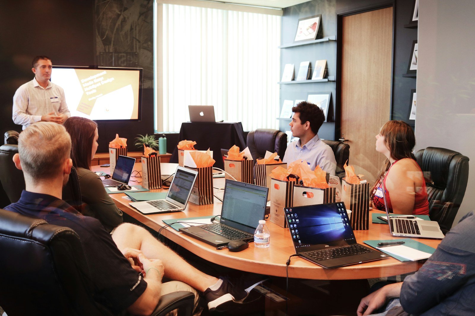 Boardroom meeting around a conference table